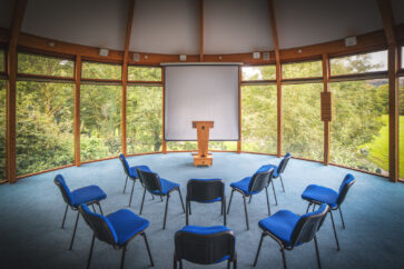 chairs set out for conference in Wesley Room